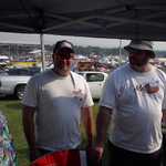 Jason and John Pehlman tell my wife how cool my truck is.