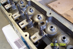 Valve guides shortened & spring step removed