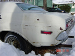 Paint cracking and lifting off red primer