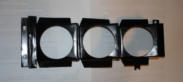 Second revision: incorporated mounting points into the piece, so no more need to hack up Message Center panels.