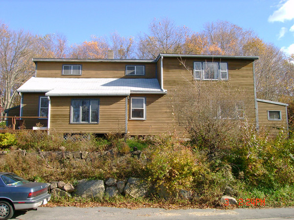 This house had not been stained for a few years, so the siding was a bit on the dry side, but not damaged.  The first coat (Cabot New Cedar semi-transparent) soaked in quickly and required a lot of stain; the second coat went on much more quickly.