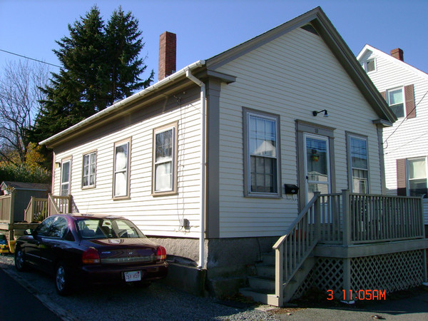The lighting makes it difficult to compare to the left side.  The front of the house faces South, so it is always in shadow.