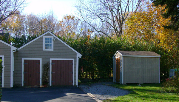 I stained this shed to match the garage next door.  Used three colors of Cabot semi-transparent stain (oil-based).