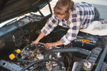 Mindy does a little work on her motor.
