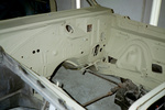 Opposite side primed engine bay.