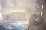 Lenny my body guy spraying primer in his garage.