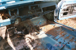 Front floor pans with usual rust. Drivers side pan had been replaced by previous owner some years before. Later found I had to replace the passengers side front floor pan.