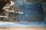 Trunk floor with usual rust. Got away with patching some spots but needed to replace trunk extensions.