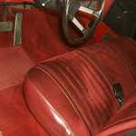 Cloth seat a previous owner installed. Looks stained in this pic, but it isn't.