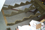 Figure out the spacing, nail (yes I said nail) a 2X4 to the floor and get after it