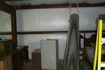 Ya have to be inventive to hang 15' long sections of ductwork by yourself...