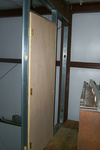 What, you may ask, is this door doing opening out over a 9' drop? There will be a FIRE POLE on the shop side of this door for an emergency exit from the living quarters.