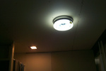 Sheetrocking the shop bathroom. Whaddaya know. The lights still work!