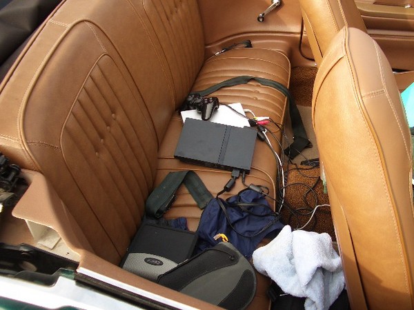 Jim Winter's Baracuda's backseat looks more like a toy store than a muscle car.