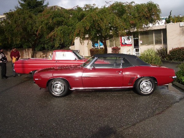 First one here with the coffee is Cindy and her 1969 Camaro.