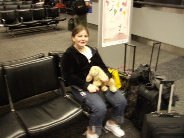 Waiting for the plane to Mouseland. This is Deanna's first time.