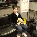 Waiting for the plane to Mouseland. This is Deanna's first time.