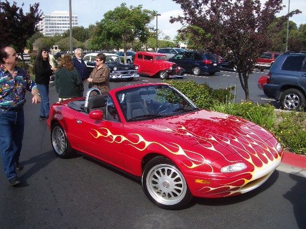 My 69 roadrunner is in the paint shop so it is up to Sally's Miata to take us to the event this year.