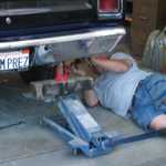 Arno helps in getting the car lower to the ground.