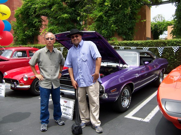MPM V.P. Steve Kuramoto and Moparts member Serge Wilson in front of Steve's challenger.