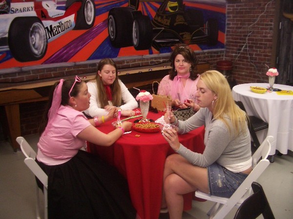Sally and the girls have lunch. Nice custome Caitlin, this was a 50's Sock Hop not a Britanny Spears concert.