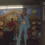 Elvis signs with the "DADDY'O" band.