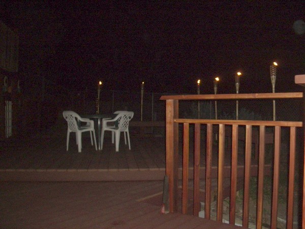 The tiki torches are lit.
