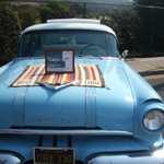 Ron places a memorial on his hood to our buddy John "442" Calais.