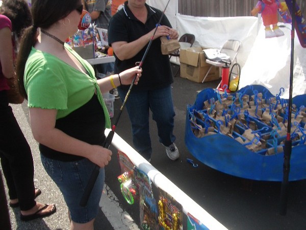 Deanna goes fishing for prizes.