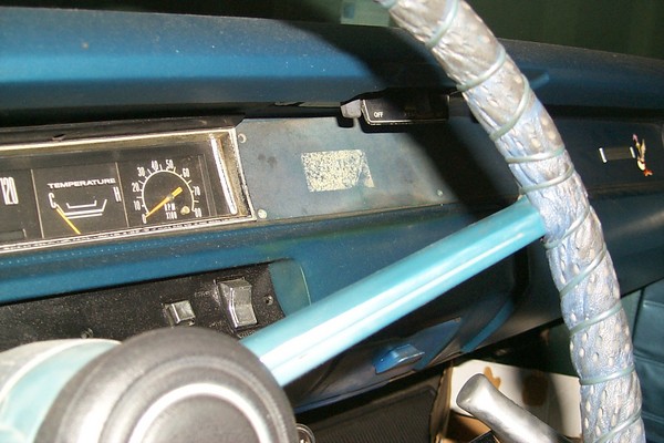 Base line steering wheel, factory tach, radio delete.