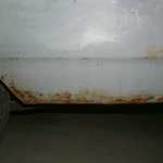 Worst rust on the car. Driver's side lower quarter