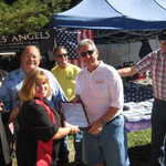 Cindy hands over the TAC award.