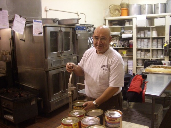 My mentor Bob, shows me how to open a can of "homemade" chilli.