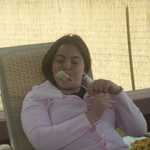 Deanna has a fruit shiskabob.