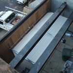 Looking down into the garage. Yep no roof to keep out the elements.