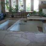 Having a swimming pool in your front room is all the rage now.