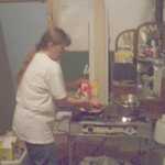 Cathy slaves away to feed us all.