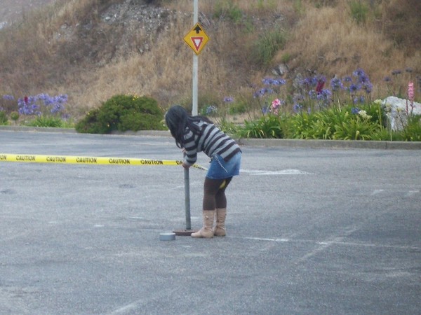 Marie is hard at work setting up the pole dancing stage.