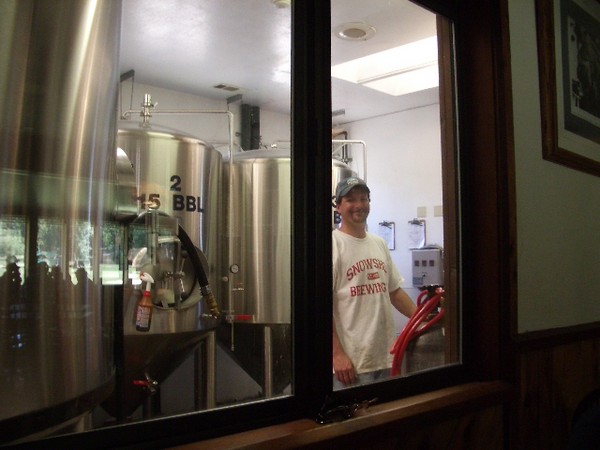 The man behind the glass is brewmaster of the Snowshoe Brewery in Arnold, Ca.