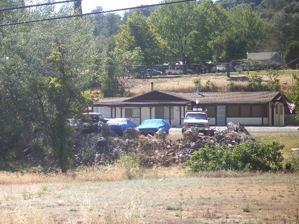 Lost for years and years these poor old Mopars are just rotting away.