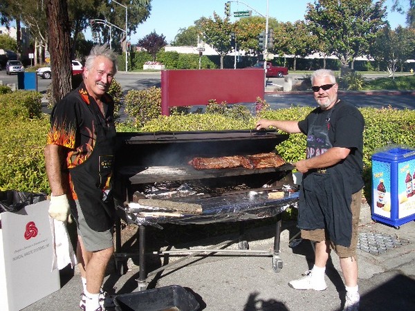 Walt and Stu fire up the BBQer.