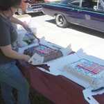 Deanna gets the MPM anniversary cakes ready.