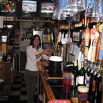My favorite bartender of the day, cause she pours beer and loves roadrunners.