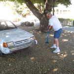 Someone left an old Ford on the property so we got to beat it in the ground for a $1 a shot. Now this is my kind of fun!