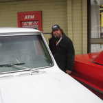 Chris finds the smoking area.