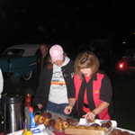 Joann and Cindy lay out the breakfest foods.