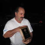 Mike Glickman presents Cindy and I with a couple of very cool award plaques.