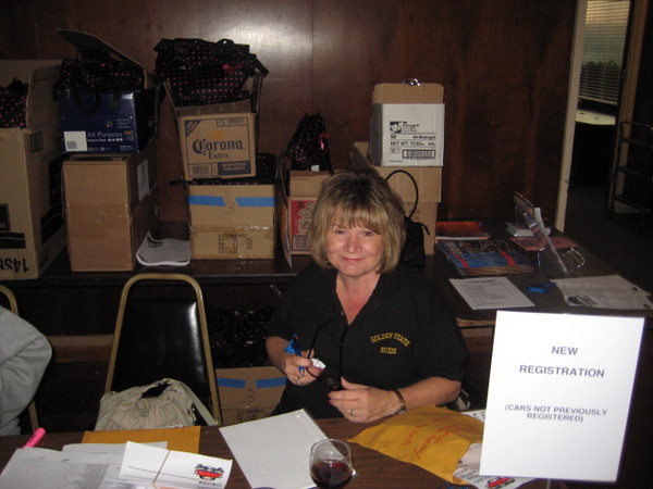 Diane Rivers puts in a long day after a long night of finishing up for the event.