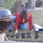 Sally counts out the charcoal. Seems we have just enough for one 25lb turkey.