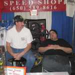 The guys are hard at work in the Gotelli Speed Shop booth.